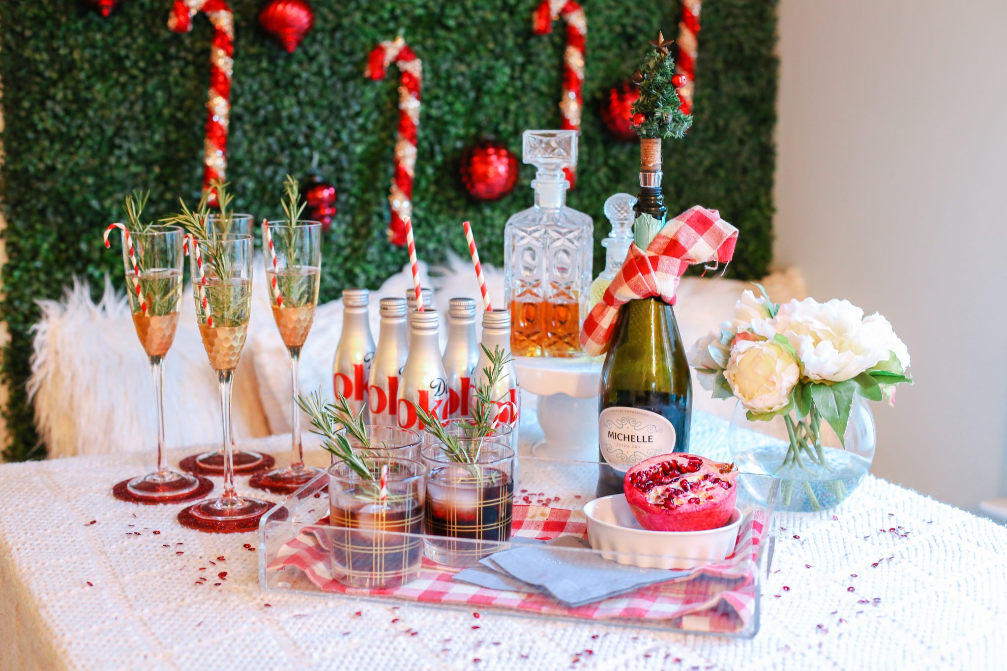 stylish christmas party drink display from thesouthernstyleguide.com, christmas party, christmas drinks, christmas cocktails, holiday bar cart, bar cart, diet coke, champagne cocktail, christmas decorations, holiday style