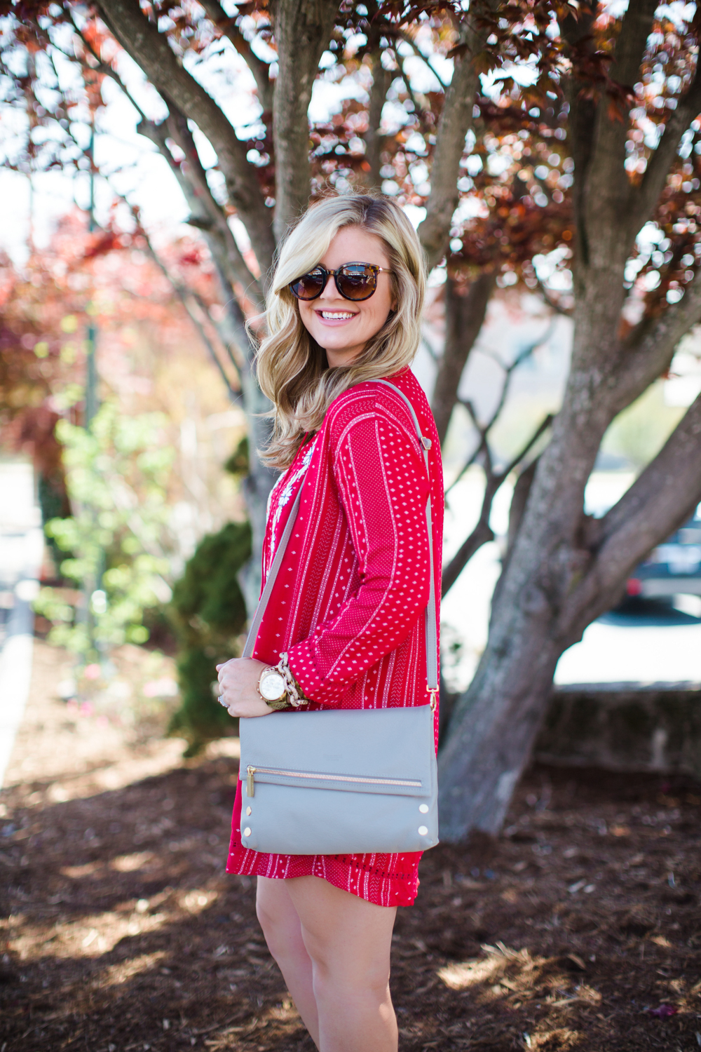 Cristin Cooper, Carolina based lifestyle blogger, styling a red embroidered dress for spring, embroidered dress