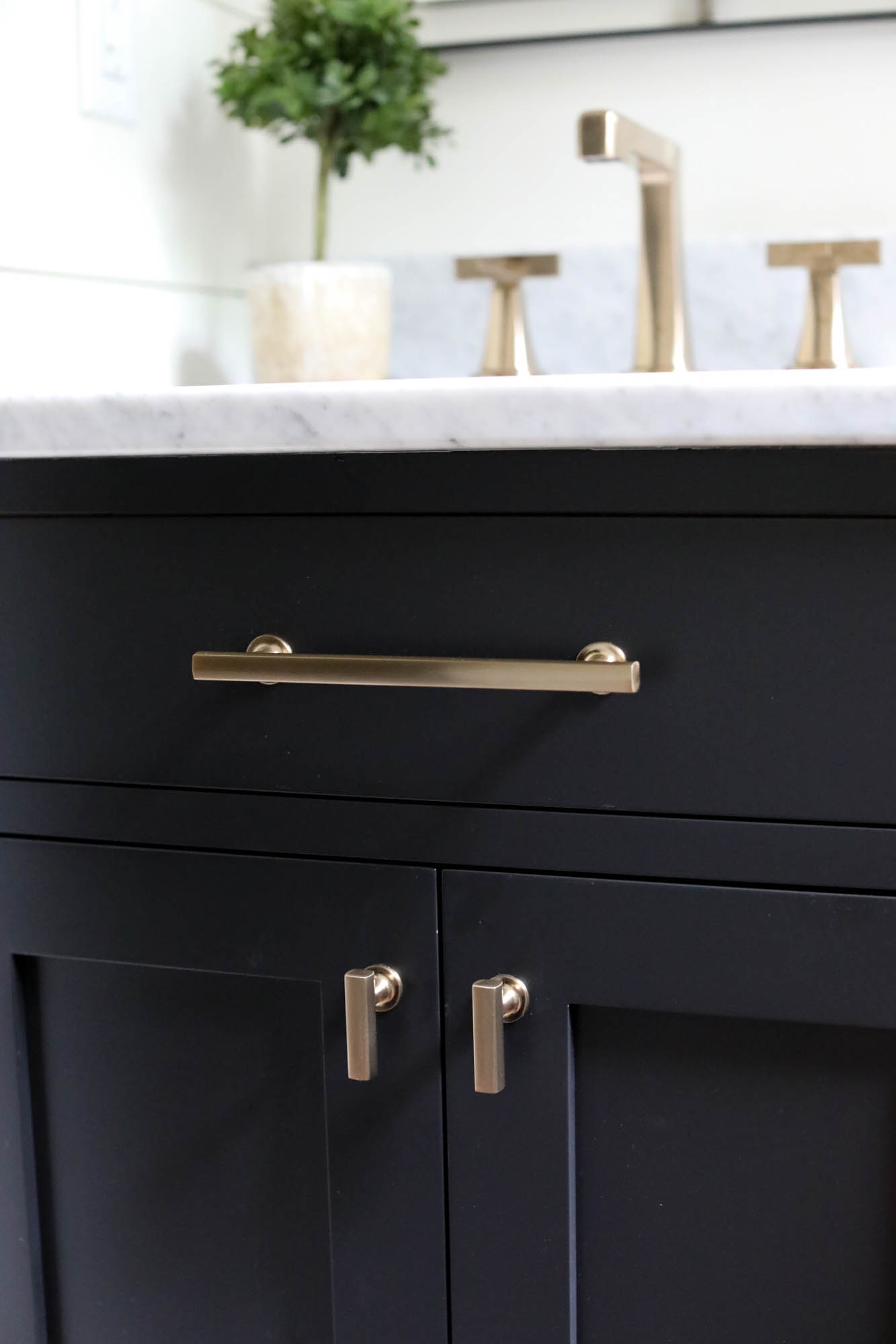 Black Cabinets with Gold Pulls