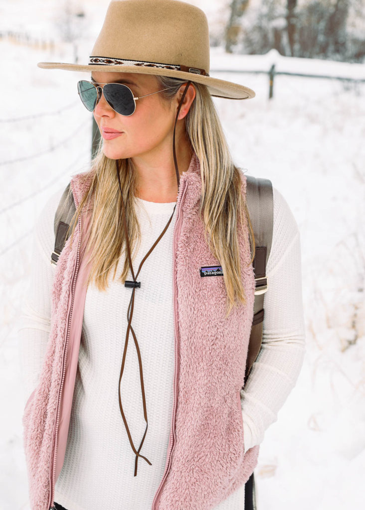 Style influencer Cristin Cooper in Patagonia vest and Stetson hat. 