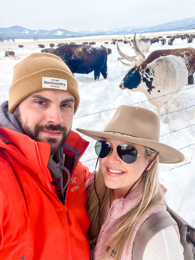 Zach and Cristin Cooper in winter outfits from Backcountry