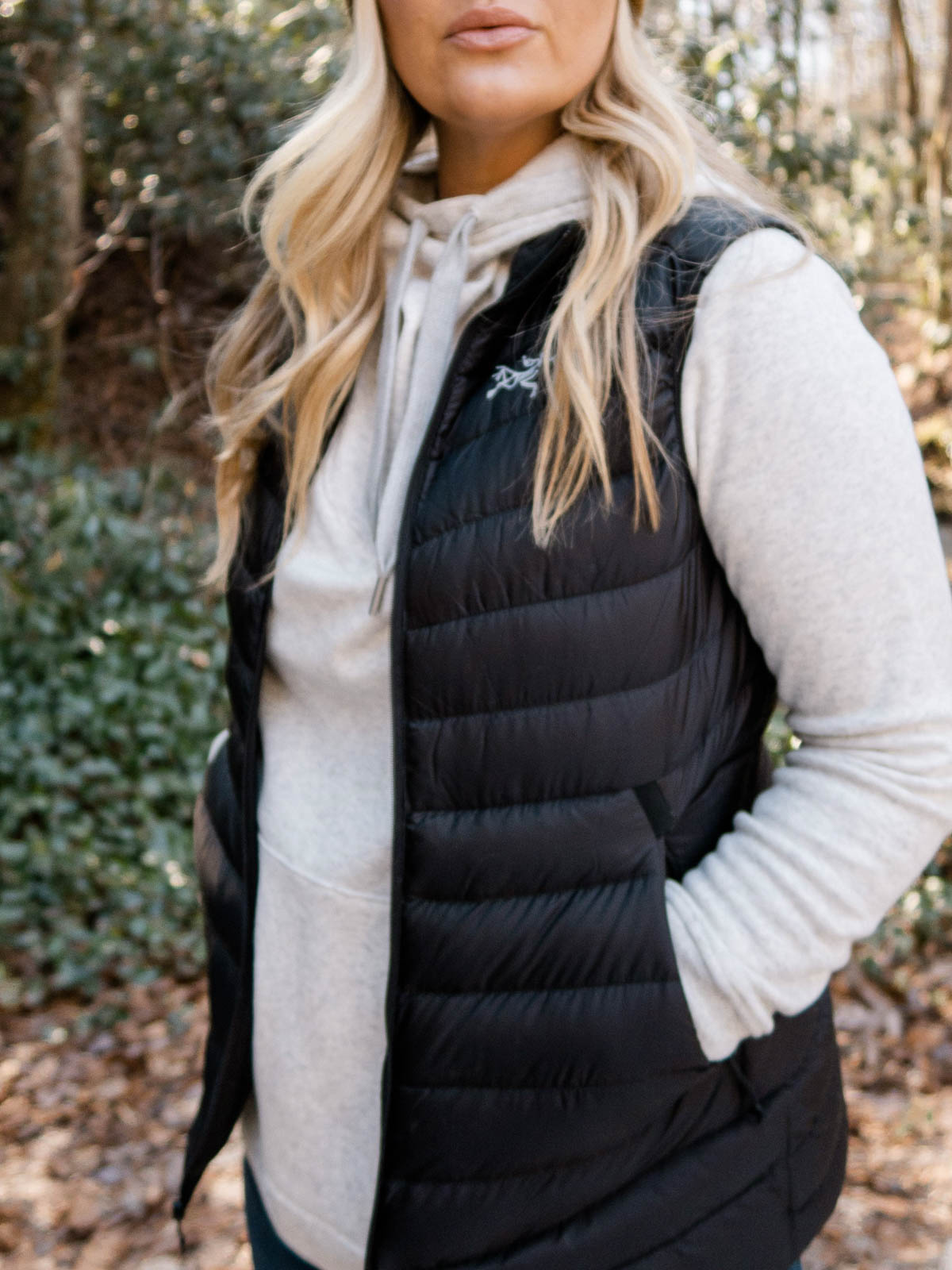 Cristin Cooper in the Arc'teryx Down Vest and Basin and Range Hoodie from Backcountry. 