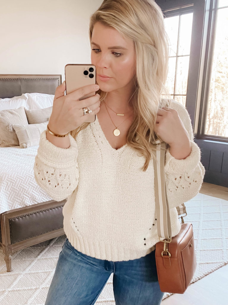 What sweaters and tops to pair with bootcut jeans from fashion blogger Cristin Cooper. 